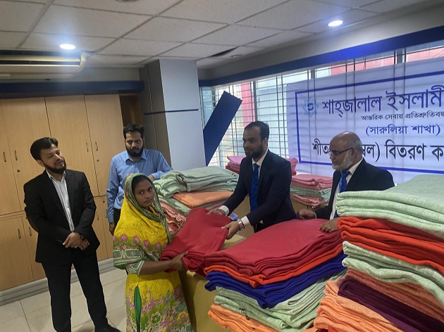 Shahjalal Islami Bank PLC distributed Blankets among winter hit and poor people at Sarulia Bazar, Demra, Dhaka